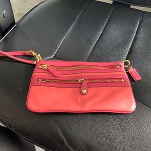 Coach wristlet in pink and coral